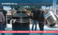 Gobierno de Esperanza entrega tinacos por pago oportuno de agua y predial