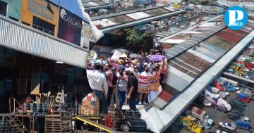 Locatarios de la Central de Abasto convivan marcha por inseguridad 