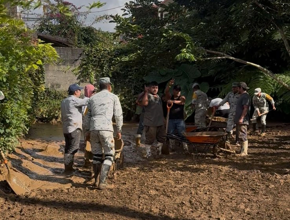 Omar Cuevas / Elementos de la Gurdia Nacional junto con la comunidad realiza faenas de limpieza