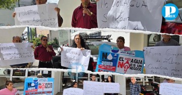 Manifestantes piden el retiro de Granjas Carroll 