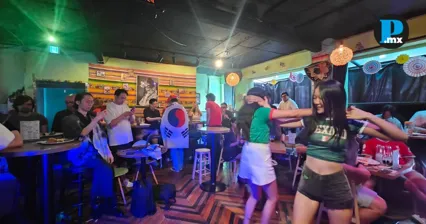Aficionados de M&eacute;xico y Corea olvidan el marcador y festejan juntos