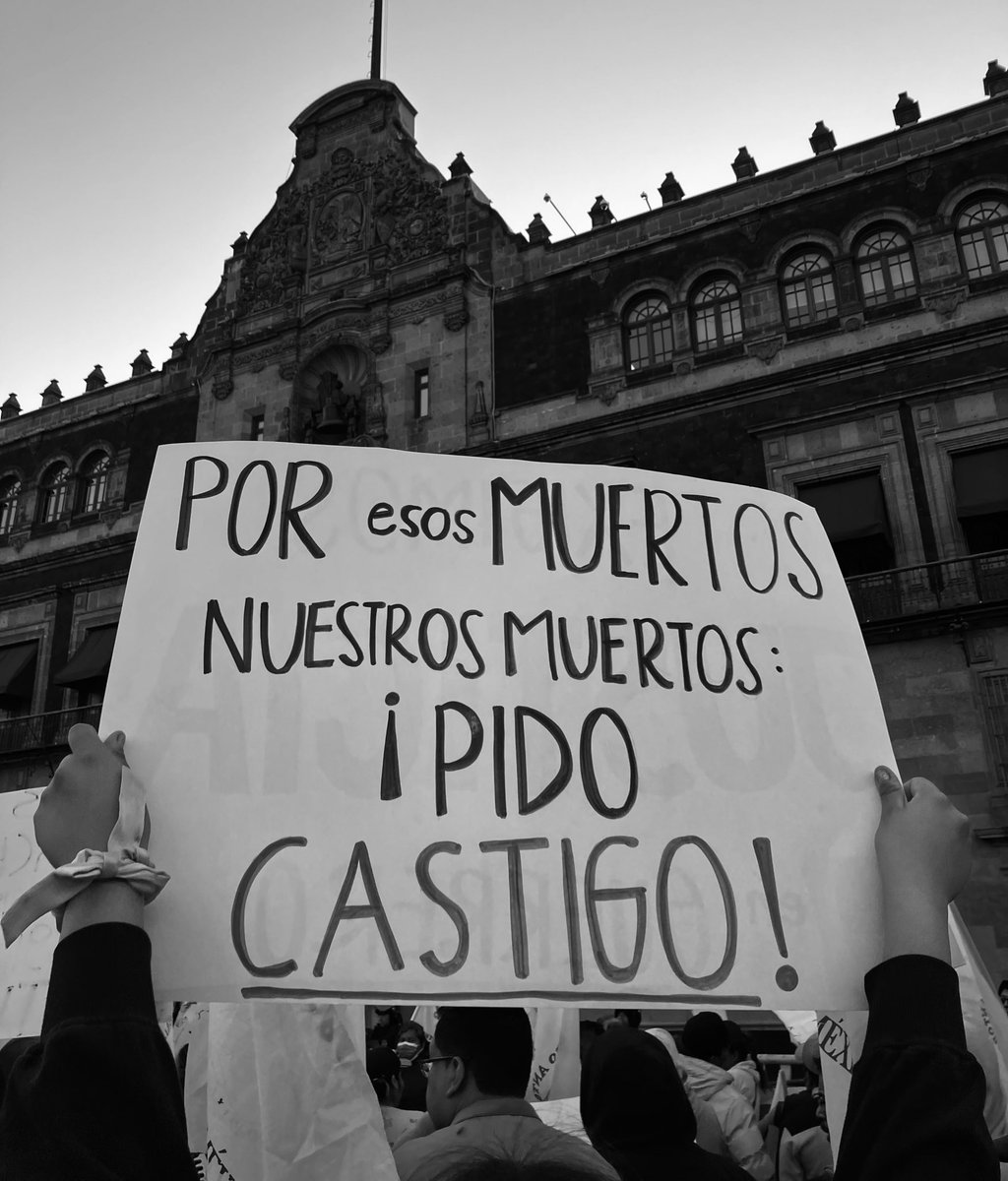 Cartel por nuestros muertos