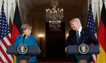 Intentan Trump y Merkel conciliar diferencias diplom&aacute;ticas