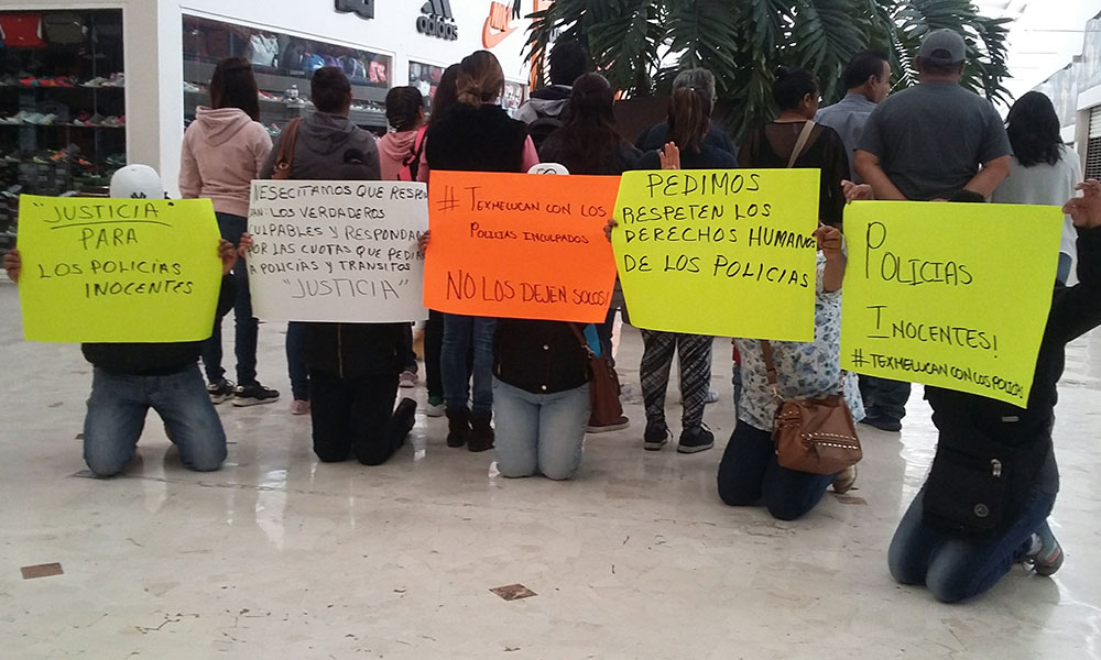 Familias de policías detenidos acusan irregularidades  