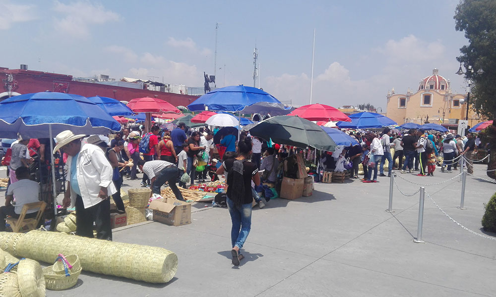 Realizan milenario trueque en San Pedro Cholula