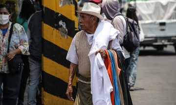 Ambulantes se resisten a abandonar calles en Cholula