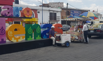 Comer o morir, comercio informal desafía a COVID-19 en Cholula