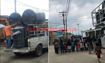 Sin medidas sanitarias, alcaldesa de Pahuatlán entrega tinacos en evento masivo 