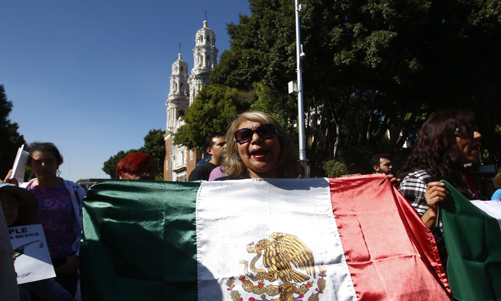 Se une Puebla a marcha contra Trump 
