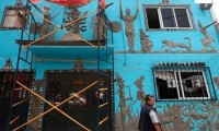 Recrean una escuela mexica en la fachada de una casa de Ciudad de México