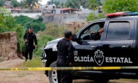 Identifican 113 cuerpos en fosa clandestina de Jalisco