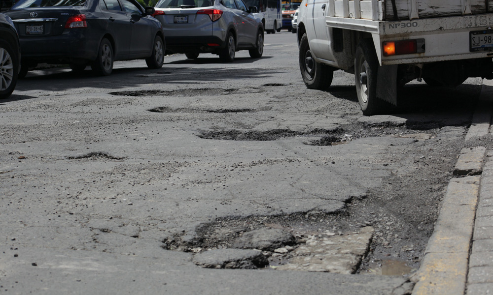 Multiplican lluvias los baches en Puebla capital