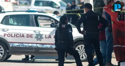 Elementos de seguridad resguardan la zona donde se realizan las diligencias correspondientes al caso