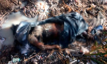 Encuentran a mujer quemada y embolsada