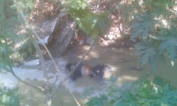 Sacan cuerpo del fondo de barranca en Amozoc 
