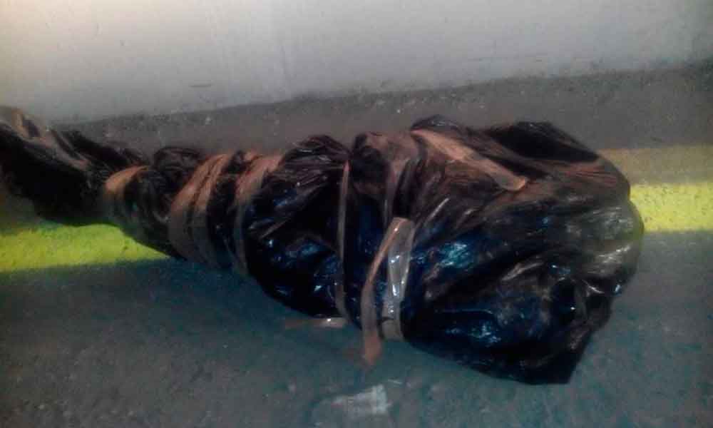 Hallan cuerpo embolsado cerca de la exhacienda de Chautla