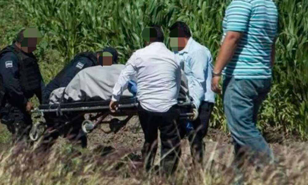 Campesinos hallan dos cuerpos torturados en Tecamachalco