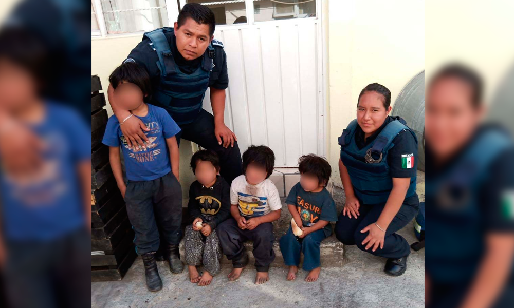 Policías salvan a cuatro pequeños durante un incendio en Puebla