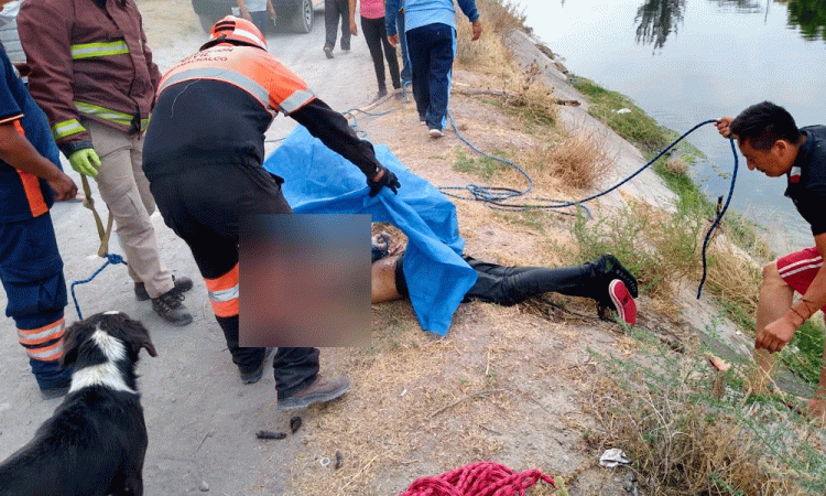 Encuentran un cadáver flotando en canal de Valsequillo en Tecamachalco