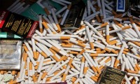Confiscan casi 30 millones de cigarros en dos tractocamiones, uno en Amozoc y otro en Xoxtla