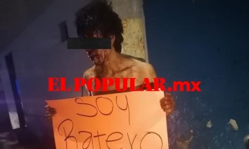 Presunto asaltante terminó golpeado y emplayado a poste en San Pablo Xochimehuacan