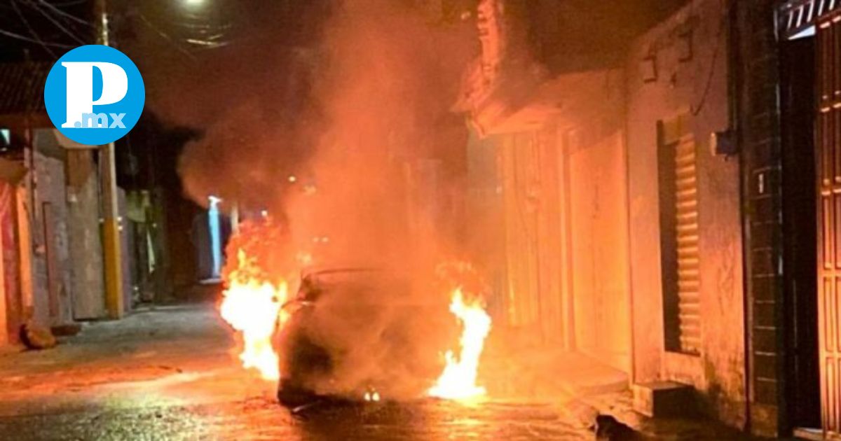 Cadáveres al interior de autos en Santa María Xonacatepec