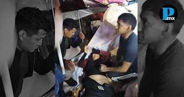 Joven cae desde lo alto de una rueda de la fortuna en la feria patronal de San Miguel Canoa.
