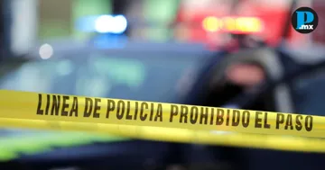 Abandonan camioneta con un cuerpo frente a la Presidencia de San Mart&iacute;n Texmelucan