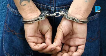 Cateo en Atlixco deja dos detenidos y aseguramiento de droga y arma