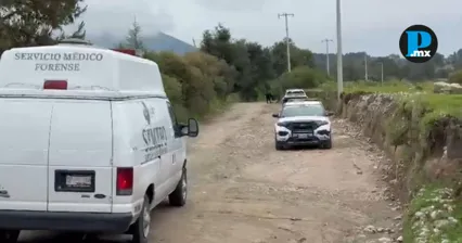 Autoridades aseguraron la zona en San Miguel Canoa tras el hallazgo de un cad&aacute;ver con huellas de violencia.