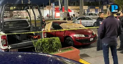 Muere hombre dentro de su auto en estacionamiento de La Gran Bodega en Puebla
