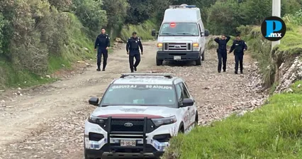 Autoridades ministeriales investigan el hallazgo del cuerpo de un vecino de San Pablo del Monte en una zona de cultivo de San Miguel Canoa, Puebla.