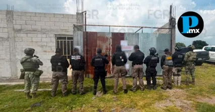 Fuerzas federales y estatales mantuvieron el resguardo perimetral de la bodega localizada en San Isidro Buensuceso durante el aseguramiento de los productos robados.